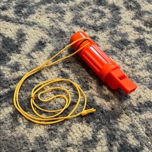 Bright Orange Safety Whistle with Yellow Cord